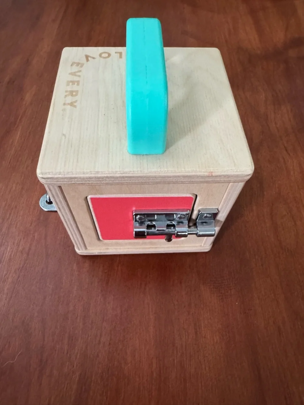 Lovevery Wooden Busy Box with Turquoise Handle